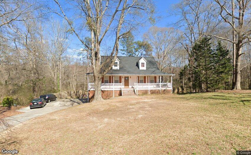 104 McKinley Court Powder Springs, GA 30127 - Photo 1 of 1 a front view of a house with a yard