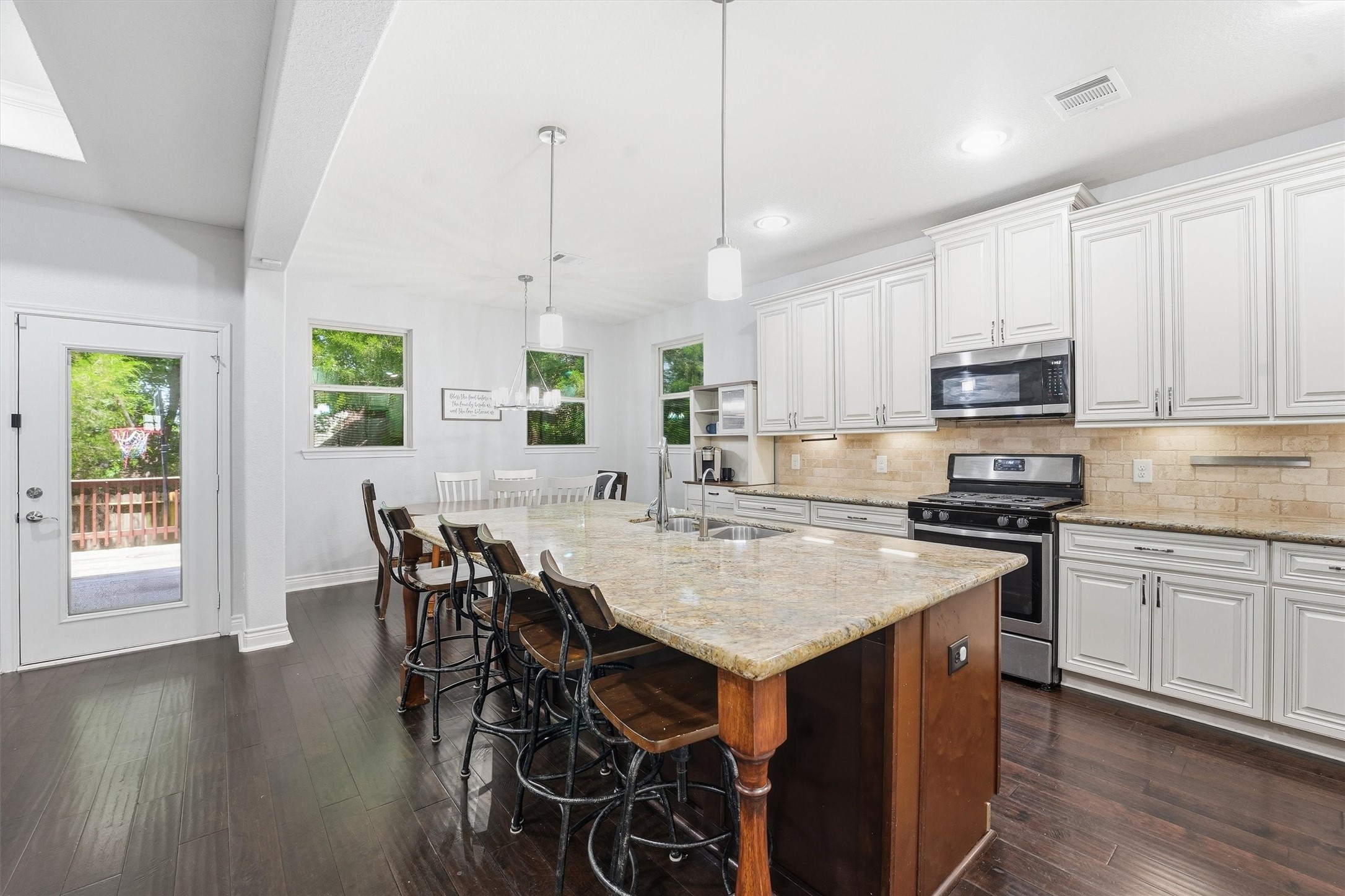 205 Kingspoint Conroe, TX 77356 - Photo 7 of 29 Kitchen with breakfast island