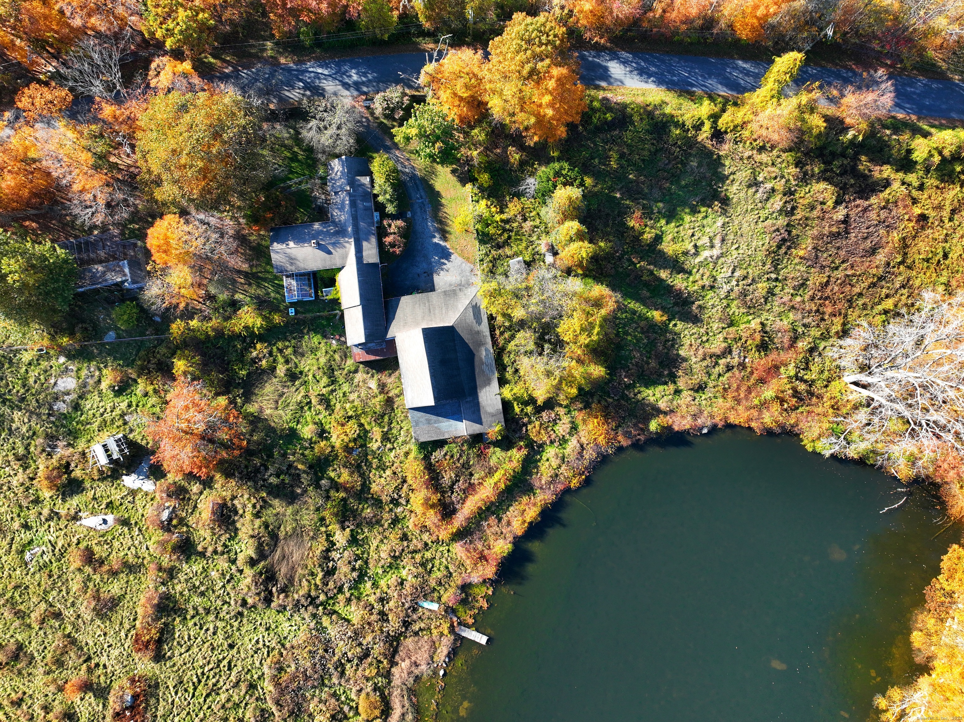308 Skiff Mountain Road Kent, CT 06757 - Photo 15 of 18 a view of a house with a yard