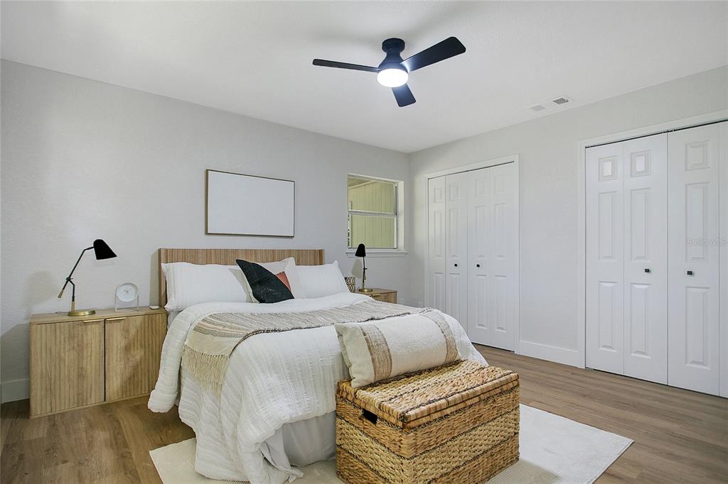 1914 Bonanza Court Winter Park, FL 32792 - Photo 12 of 33 a bedroom with bed and wooden floor