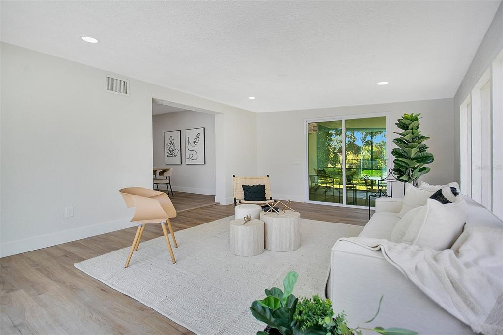 1914 Bonanza Court Winter Park, FL 32792 - Photo 20 of 33 a living room with furniture and a large window