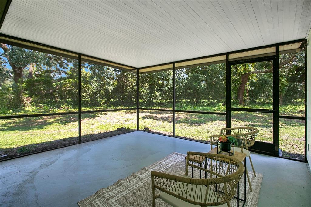 1914 Bonanza Court Winter Park, FL 32792 - Photo 21 of 33 a view of a living room and a floor to ceiling window