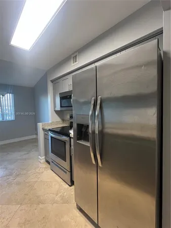 $2,249 | 9777 Westview Drive, Unit 1128, Coral Springs, FL 33076