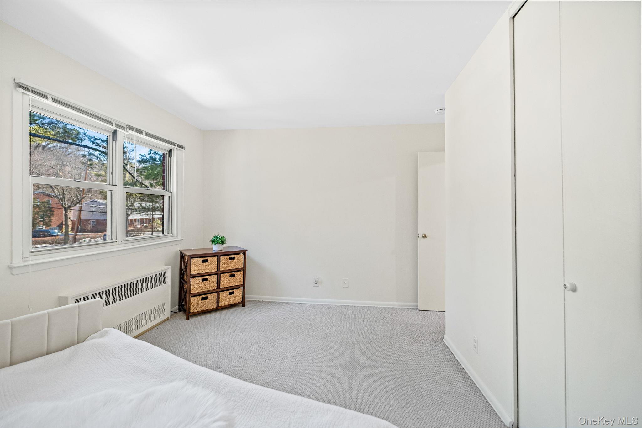 9 Geneva Road, Unit 9 Ossining, NY 10562 - Photo 19 of 26 a view of room with window and cabinet