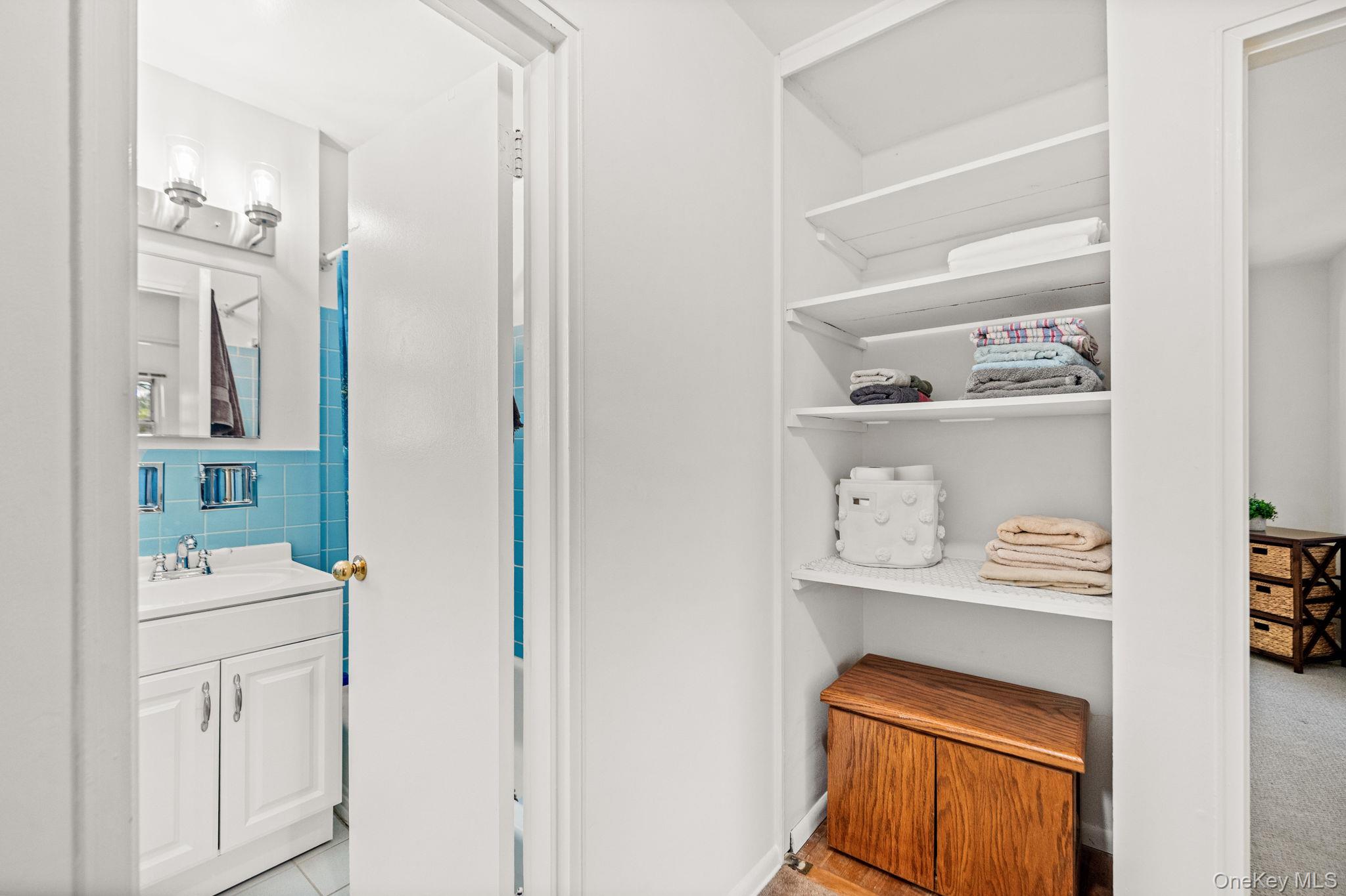9 Geneva Road, Unit 9 Ossining, NY 10562 - Photo 20 of 26 a bathroom with a sink a toilet and a mirror