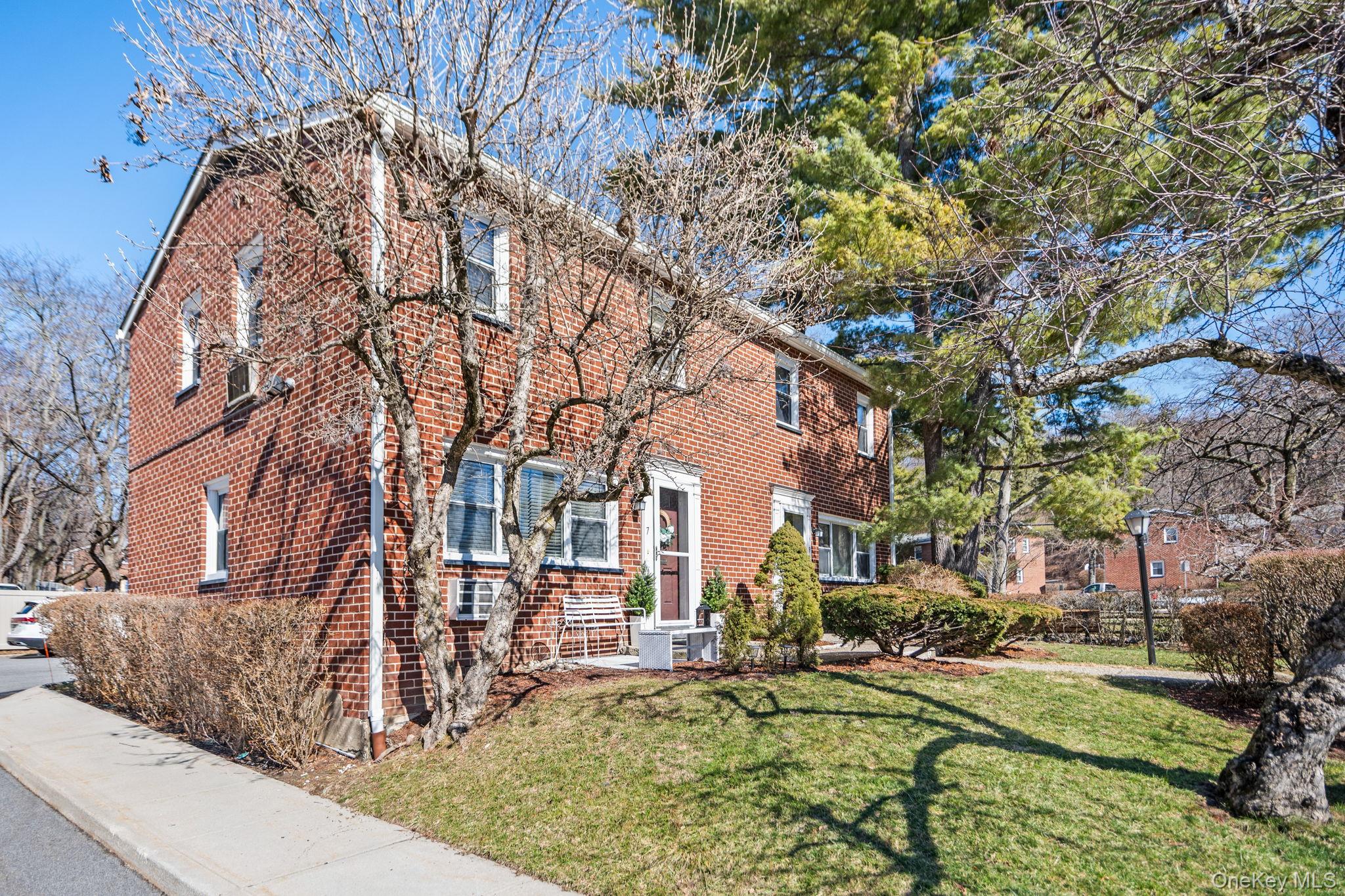 9 Geneva Road, Unit 9 Ossining, NY 10562 - Photo 23 of 26 a view of a house with a yard