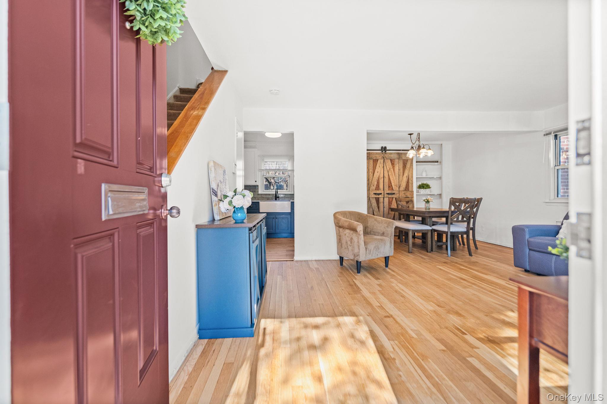 9 Geneva Road, Unit 9 Ossining, NY 10562 - Photo 3 of 26 a dining room with furniture and wooden floor