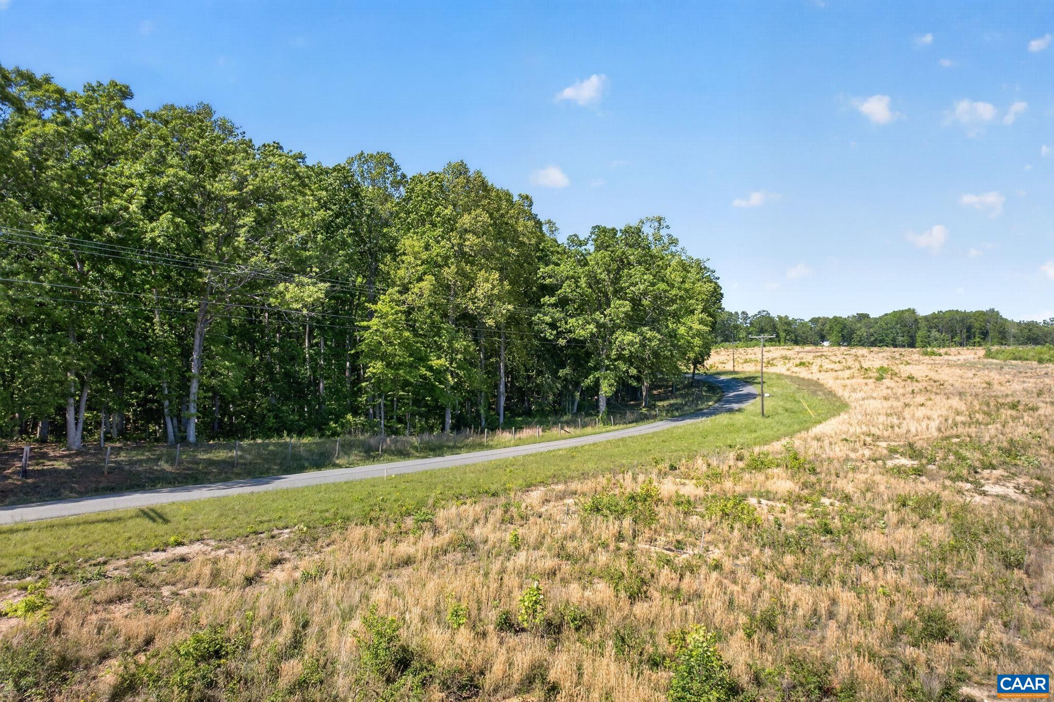 Lot 1 Shores Road Palmyra, VA 22963 - Photo 4 of 5 a view of a yard with an outdoor space and seating area