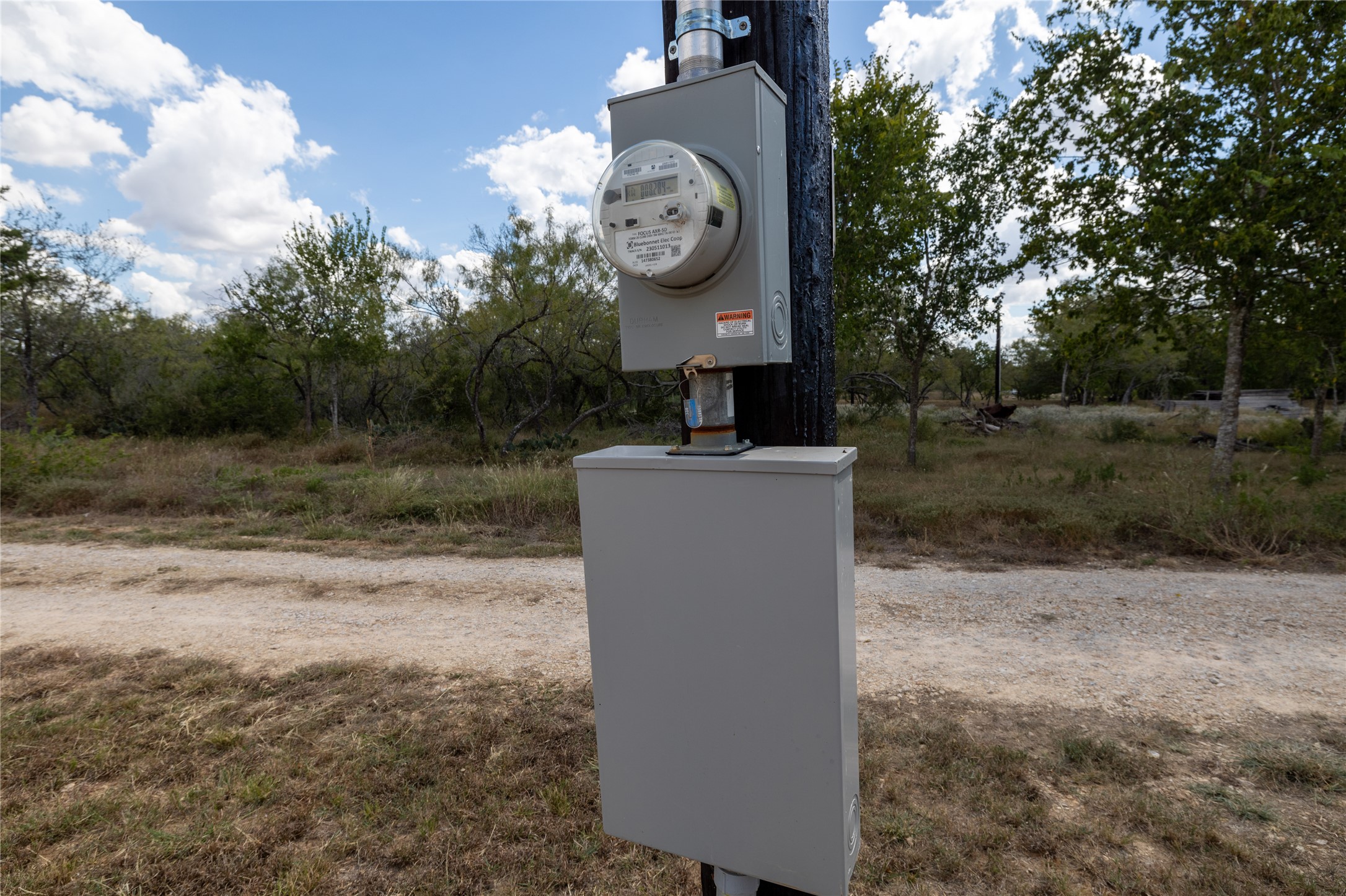 1265 Bugtussle Lane Lockhart, TX 78644 - Photo 12 of 16 a area with lots of trees in the background