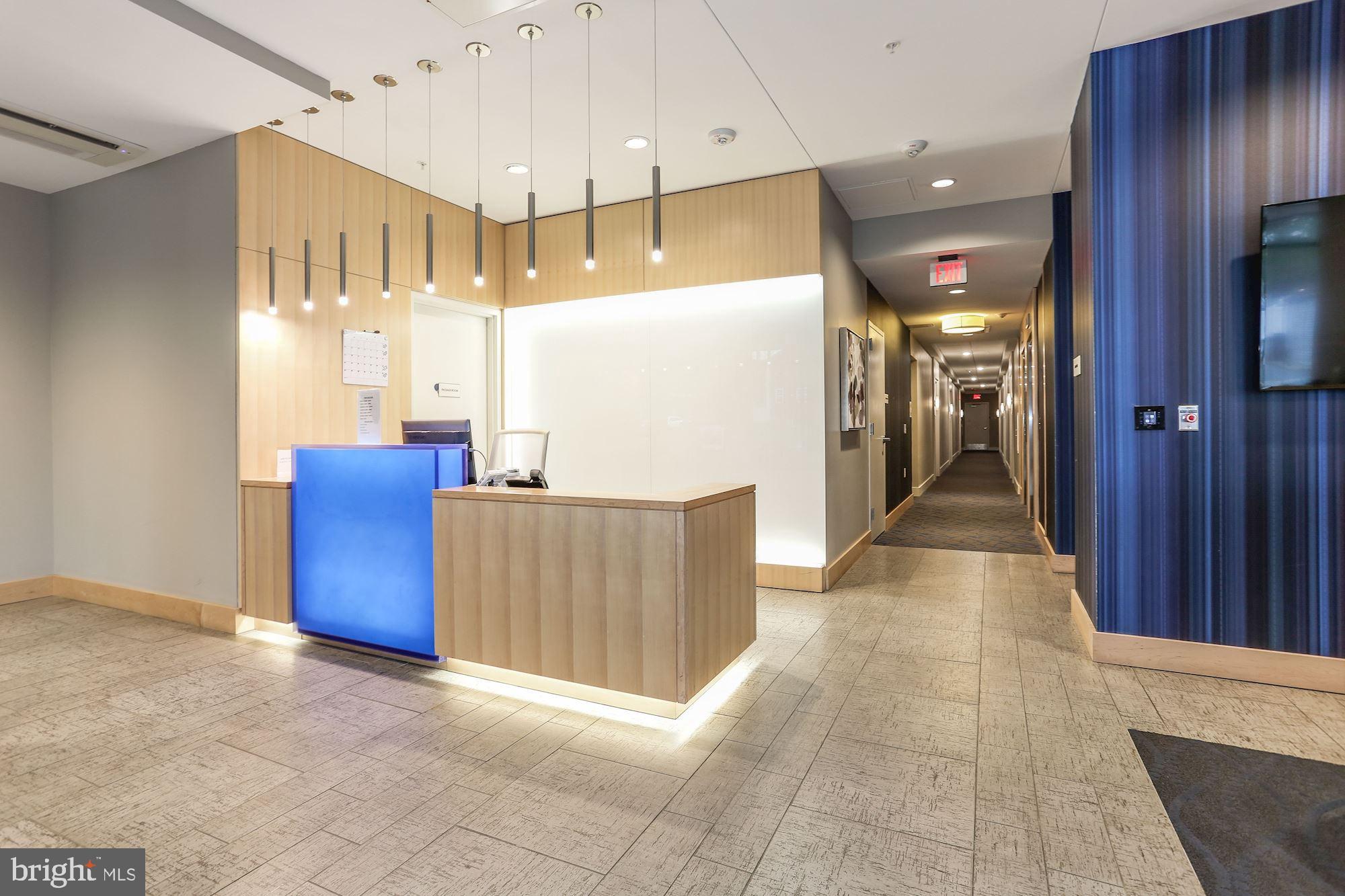 1320 Fenwick Lane, Unit 202 Silver Spring, MD 20910 - Photo 15 of 19 a view of a hallway with seating area