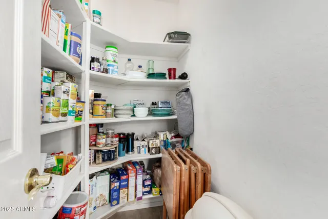 a room with storage and utility