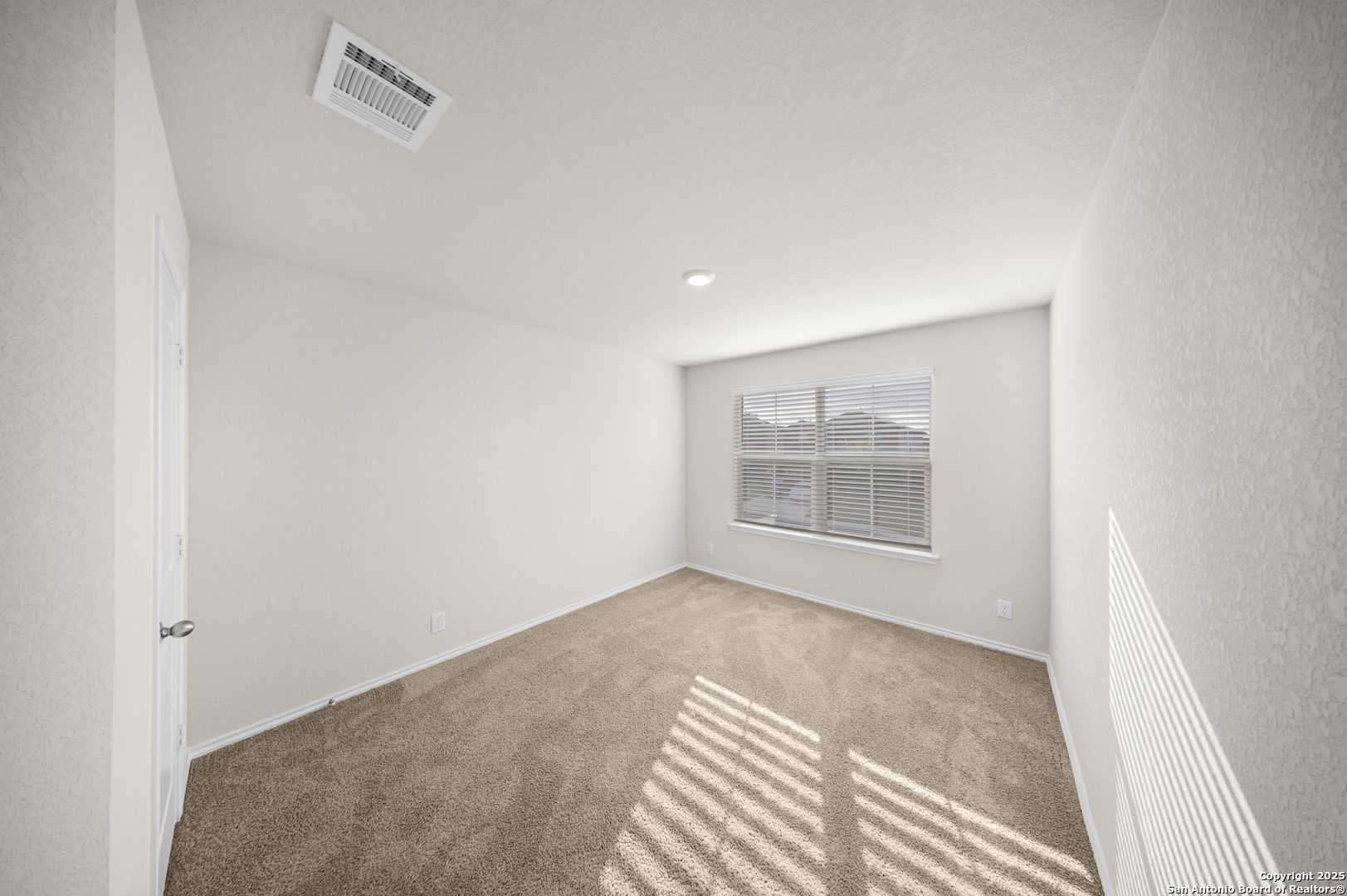 1023 Andean Emerald San Antonio, TX 78253 - Photo 13 of 19 a view of an empty room with a window