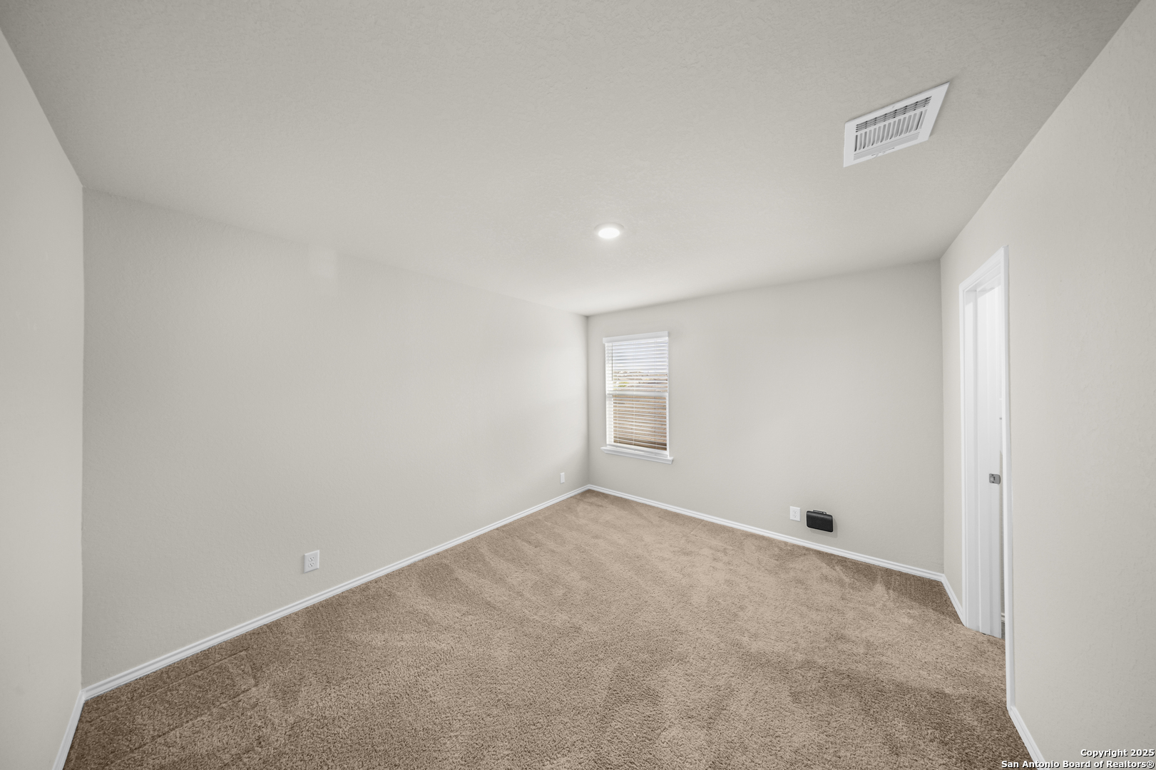 1023 Andean Emerald San Antonio, TX 78253 - Photo 14 of 19 an empty room with a empty space and windows
