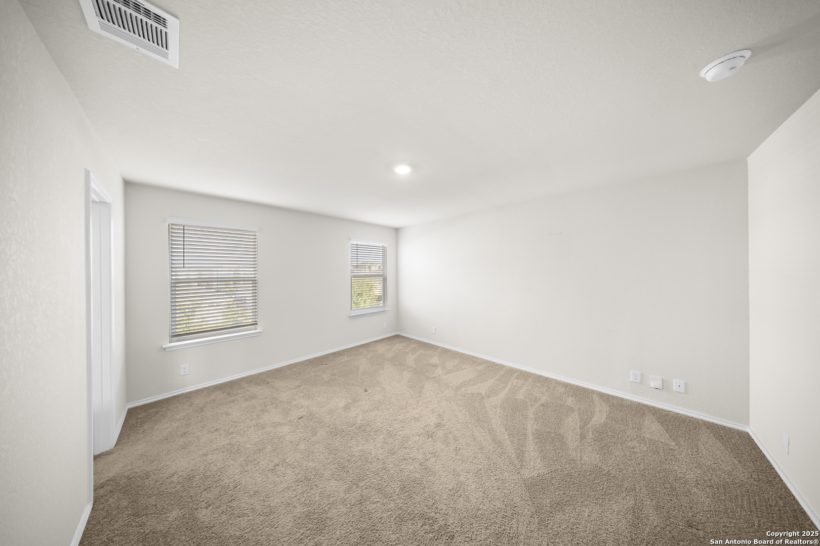 1023 Andean Emerald San Antonio, TX 78253 - Photo 16 of 19 an empty room with windows