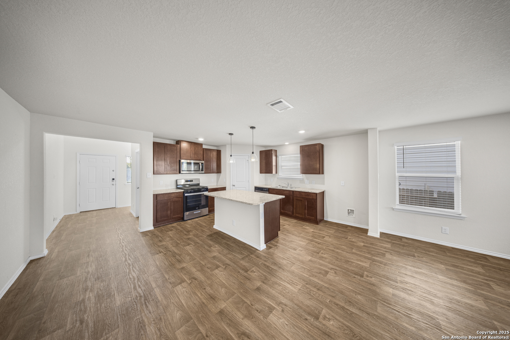 1023 Andean Emerald San Antonio, TX 78253 - Photo 6 of 19 a living room with furniture and kitchen view