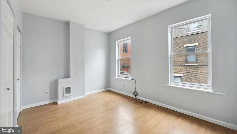 1402 North Newkirk Street, Unit B Philadelphia, PA 19121 - Photo 2 of 9 a view of an empty room with a window