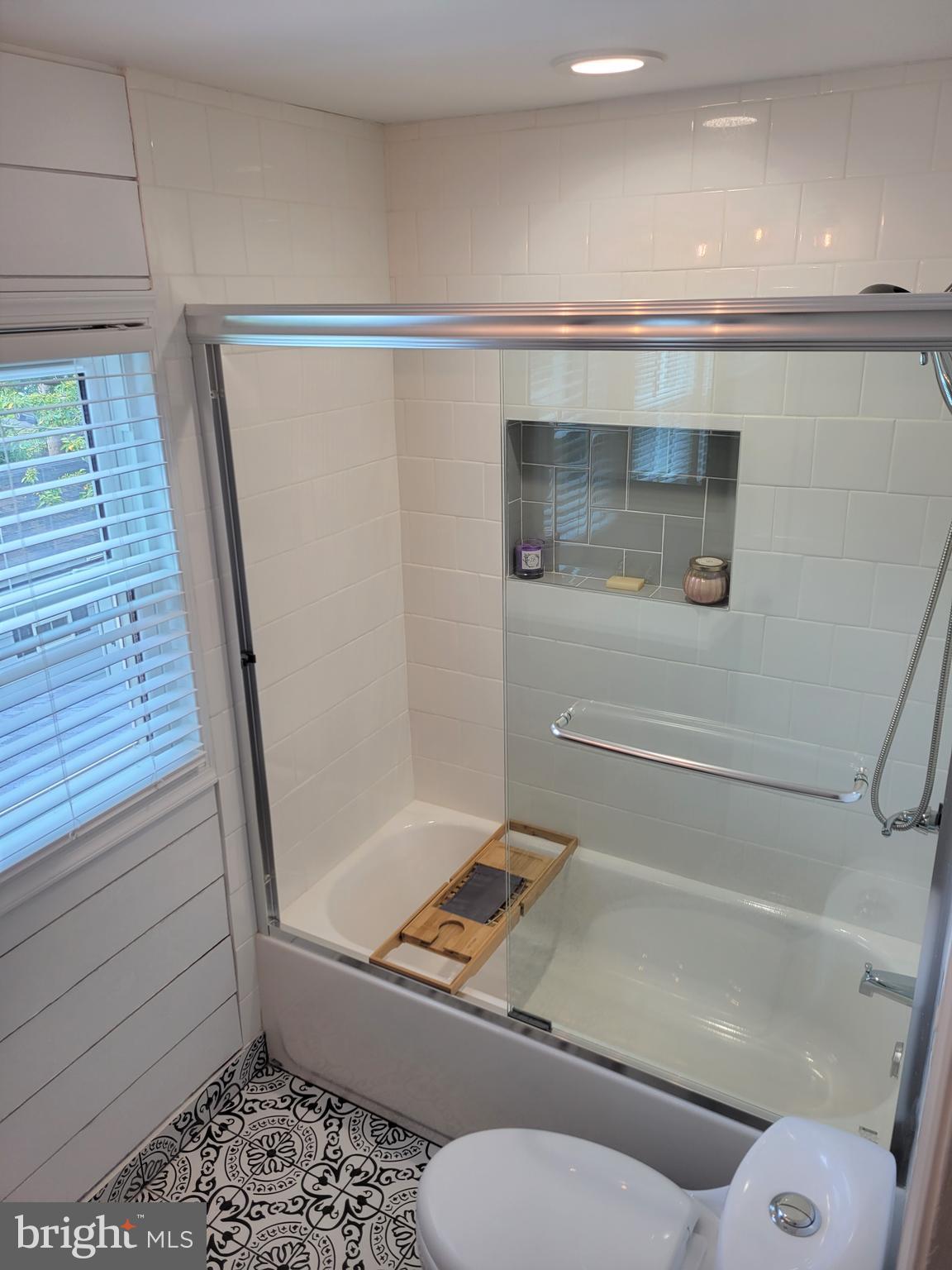2212 Avon Road Ardmore, PA 19003 - Photo 13 of 23 a bathroom with a tub and a shower