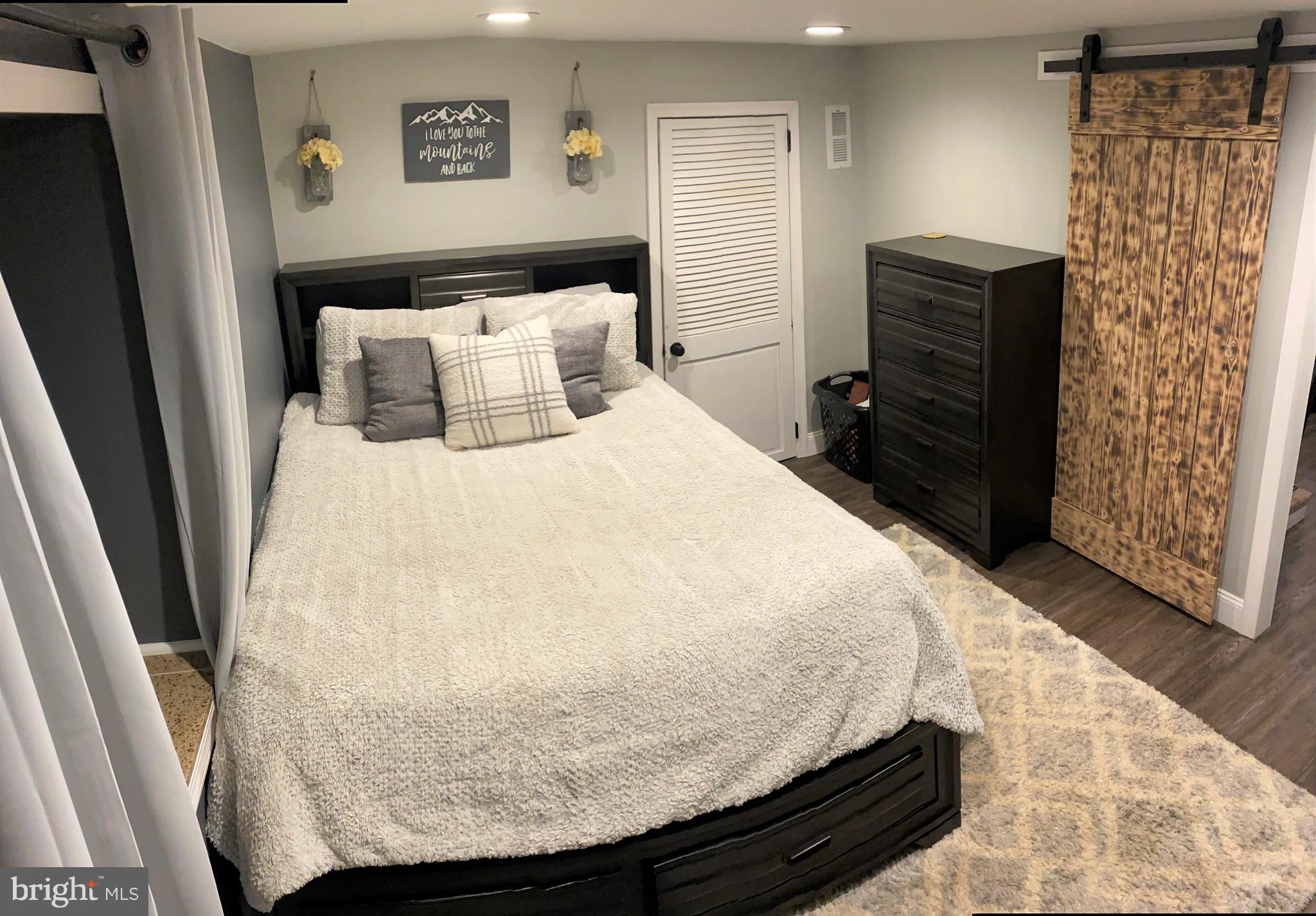 2212 Avon Road Ardmore, PA 19003 - Photo 17 of 23 a bedroom with a bed and a shower