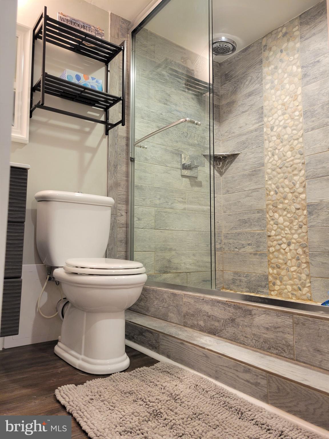 2212 Avon Road Ardmore, PA 19003 - Photo 20 of 23 a bathroom with a toilet and a shower