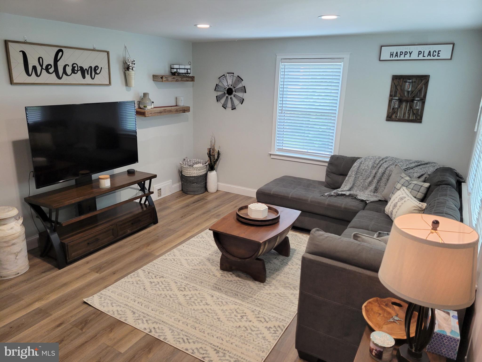2212 Avon Road Ardmore, PA 19003 - Photo 4 of 23 a living room with furniture and a flat screen tv
