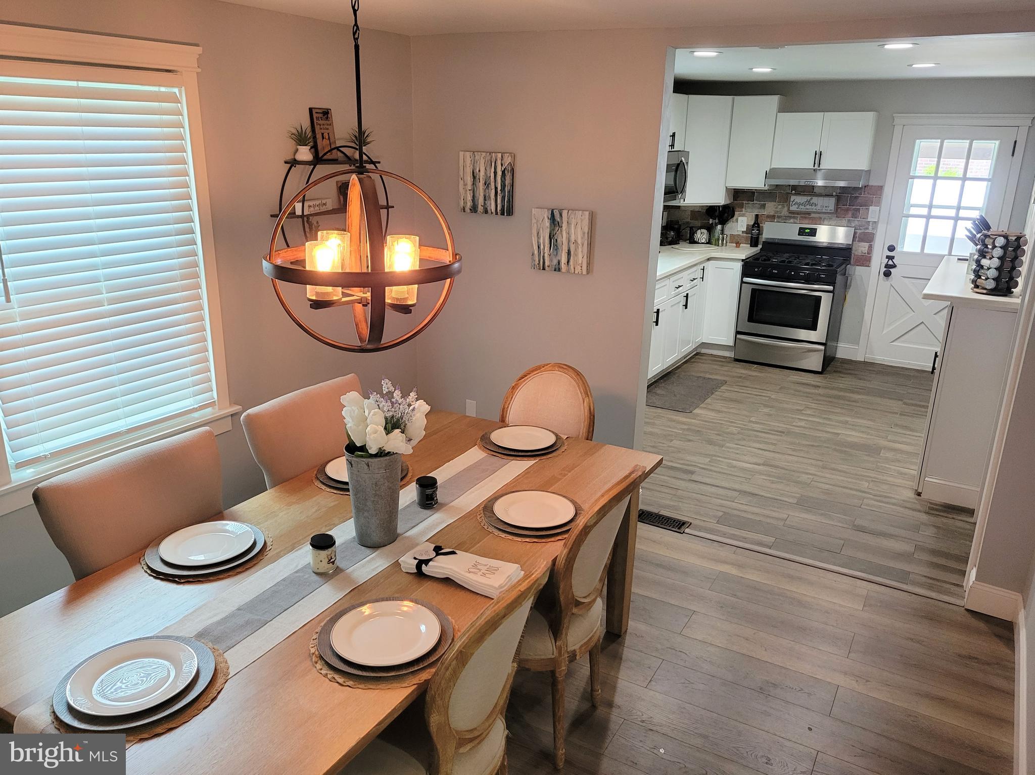 2212 Avon Road Ardmore, PA 19003 - Photo 6 of 23 a view of a dining room with furniture and wooden floor