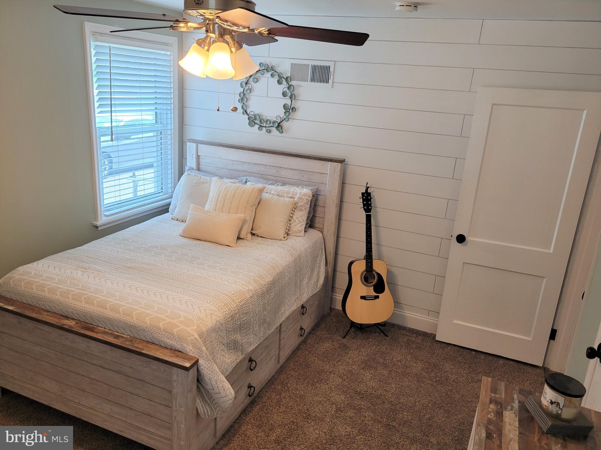 2212 Avon Road Ardmore, PA 19003 - Photo 9 of 23 a bedroom with a bed and window