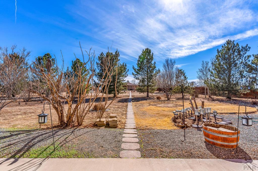 2064 Iris Road Pueblo, CO 81006 - Photo 34 of 56 a view of a backyard of the house