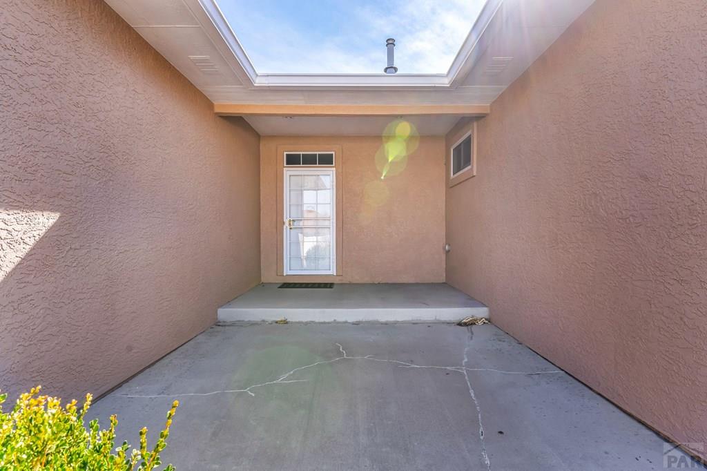 2064 Iris Road Pueblo, CO 81006 - Photo 35 of 56 a view of an empty room with a window