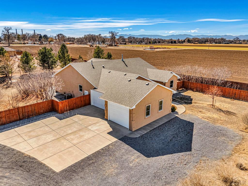 2064 Iris Road Pueblo, CO 81006 - Photo 42 of 56 a view of a terrace with lawn chairs and ocean view
