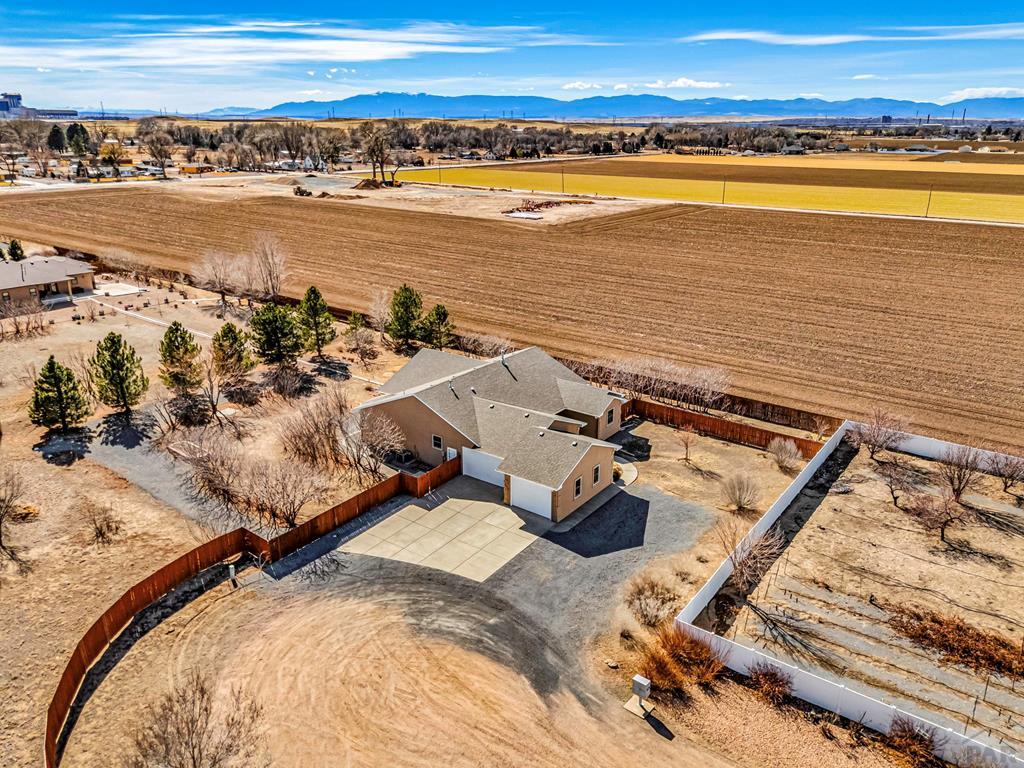 2064 Iris Road Pueblo, CO 81006 - Photo 48 of 56 an ocean beach with residential house and ocean view