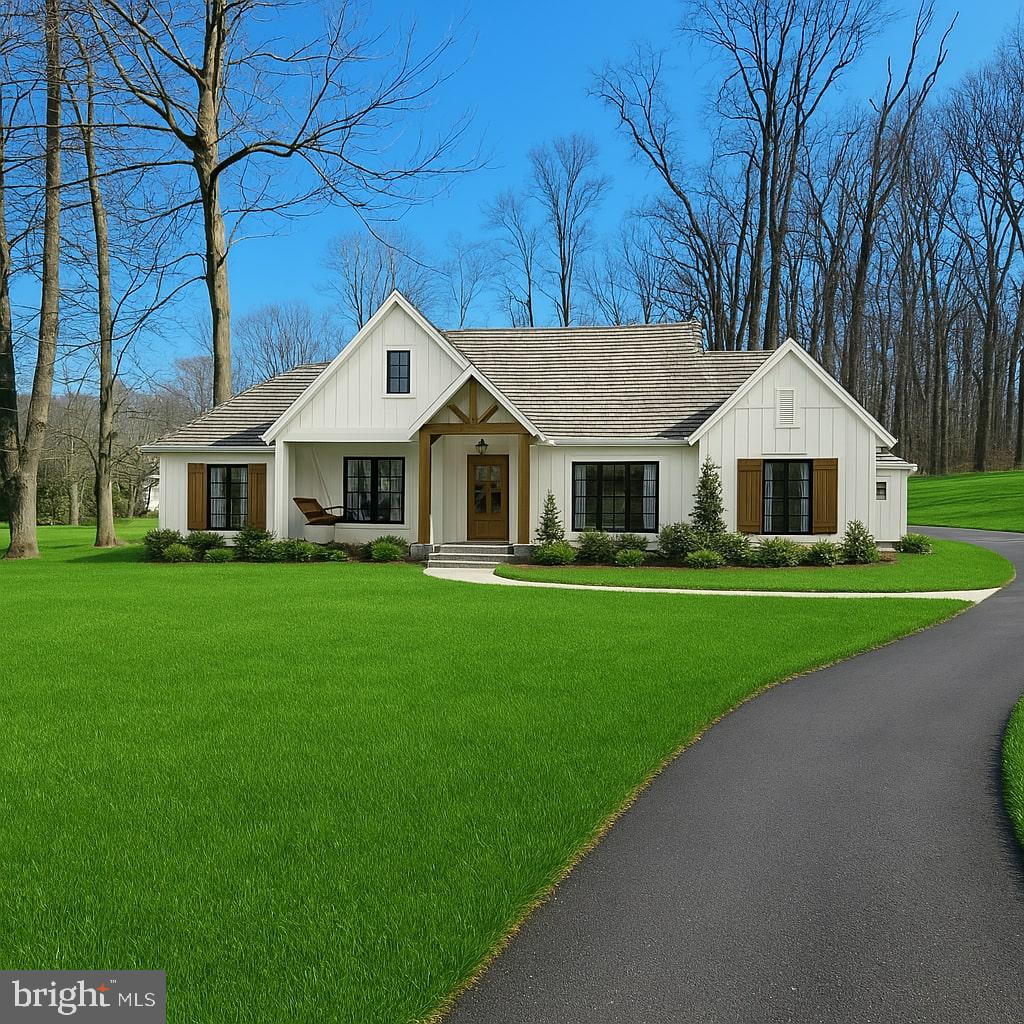 152 Icedale Road Honey Brook, PA 19344 - Photo 2 of 18 a front view of a house with a garden and yard