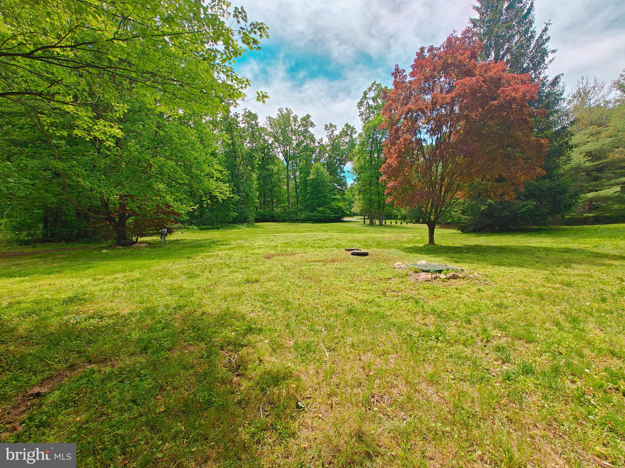 152 Icedale Road Honey Brook, PA 19344 - Photo 3 of 18 a view of a field with a tree