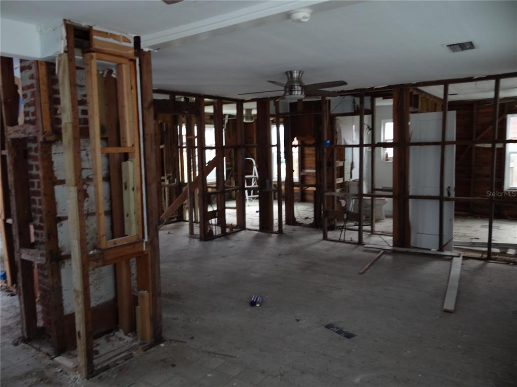 14117 Palm Street Madeira Beach, FL 33708 - Photo 12 of 25 a view of a room with gym equipment