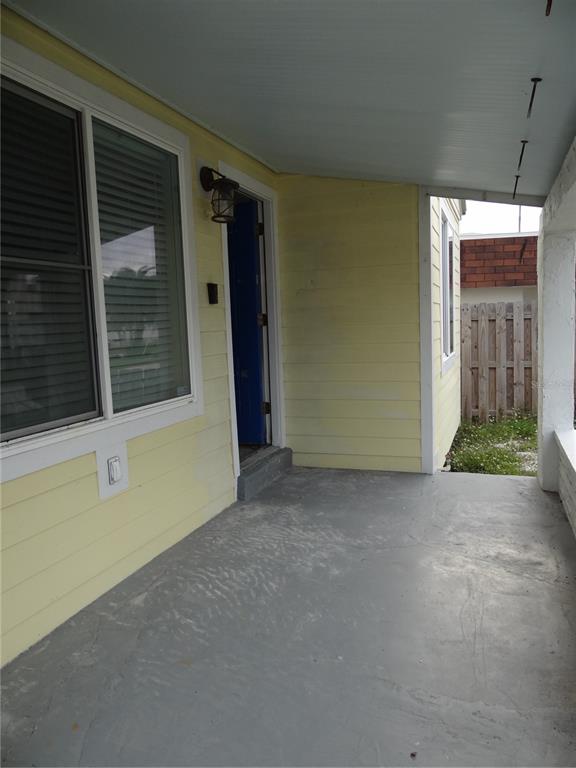 14117 Palm Street Madeira Beach, FL 33708 - Photo 23 of 25 a view of an empty room with a window