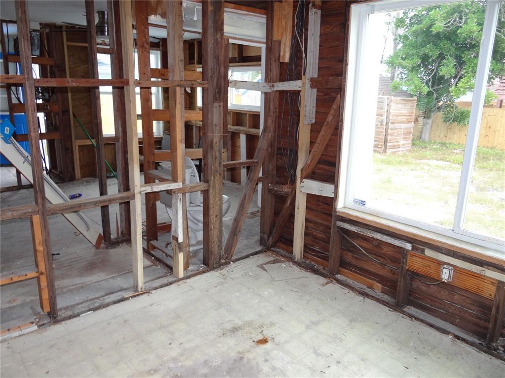 14117 Palm Street Madeira Beach, FL 33708 - Photo 10 of 25 a view of an entryway with staircase