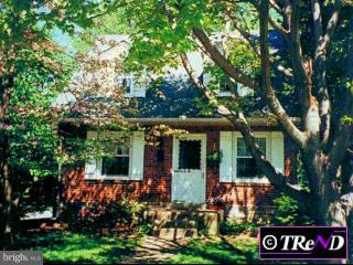 359 Shaw Road Ridley Park, PA 19078 - Photo 1 of 1 front view of a house with a tree