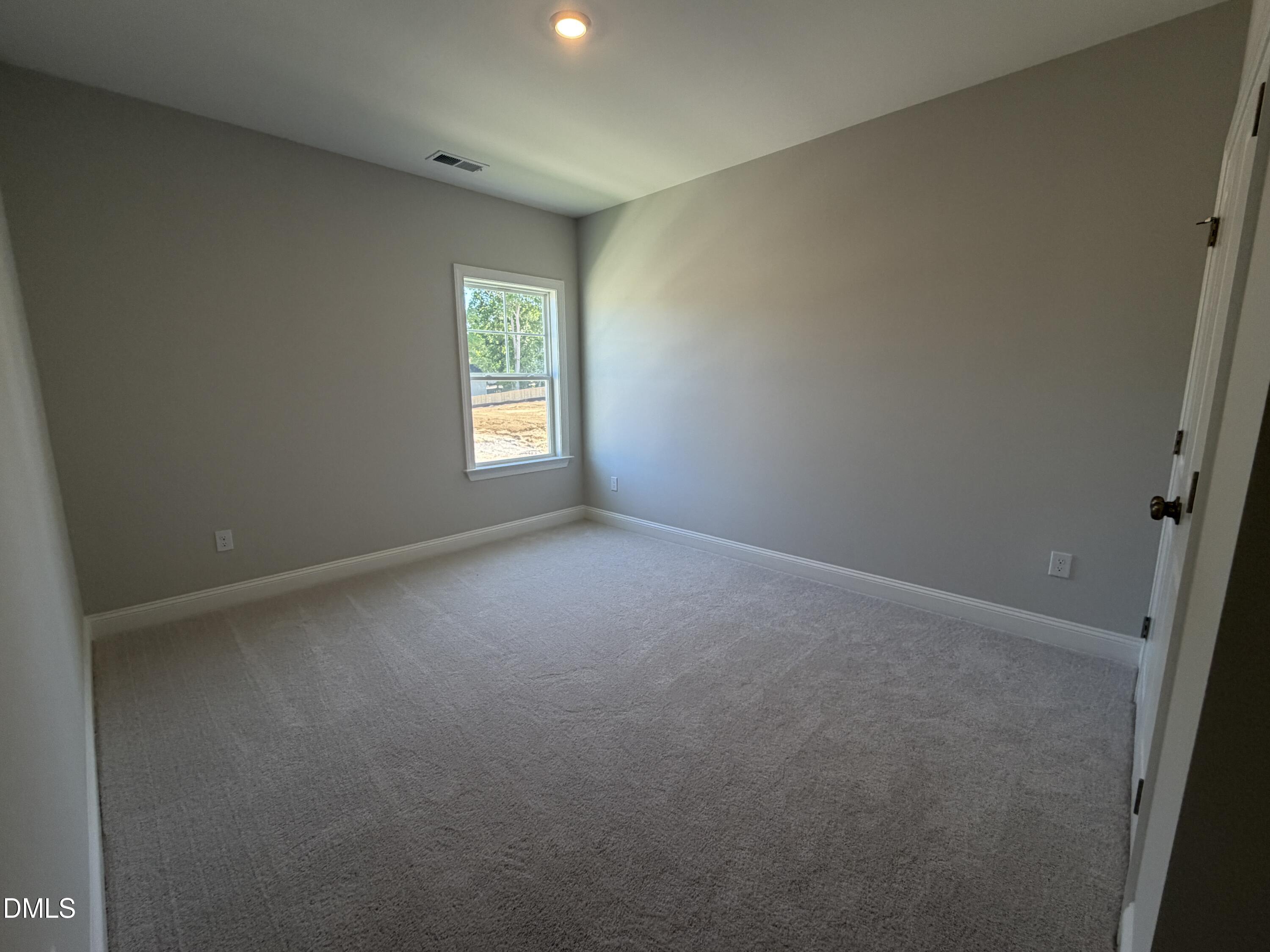 3016 Sandy Bluff Road Raleigh, NC 27616 - Photo 25 of 34 an empty room with windows
