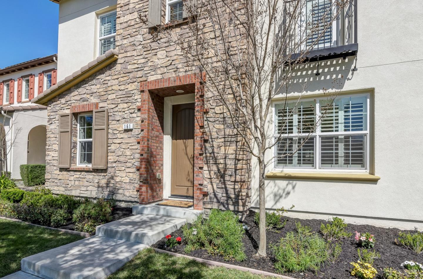 161 Lucy Lane San Ramon, CA 94582 - Photo 3 of 5 a front view of a house with a garden