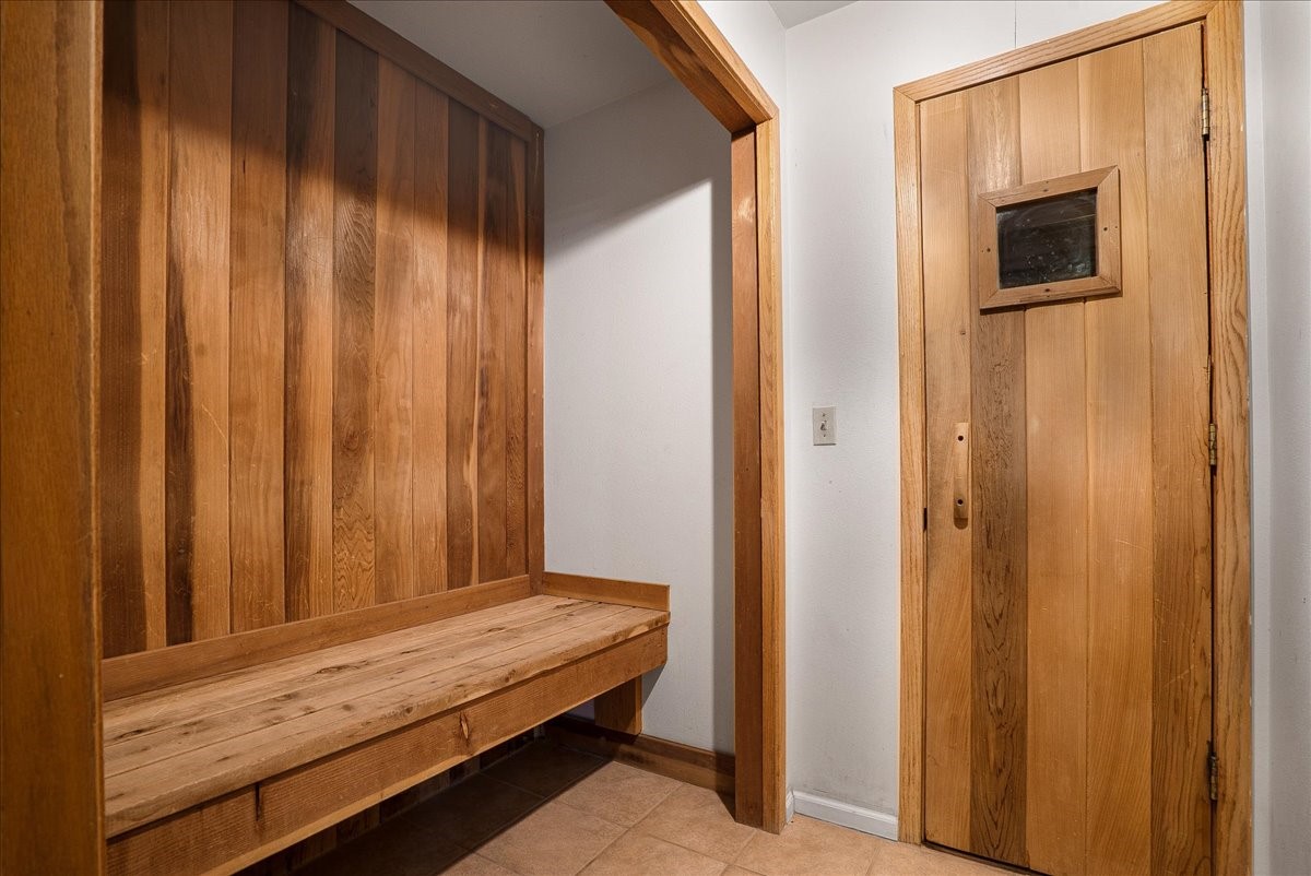 120 Sawmill Road, Unit 106 Breckenridge, CO 80424 - Photo 15 of 25 a wooden bed with curtain
