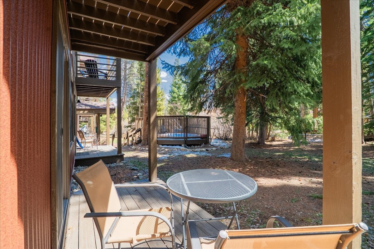120 Sawmill Road, Unit 106 Breckenridge, CO 80424 - Photo 18 of 25 a backyard of a house with yard barbeque oven and outdoor seating
