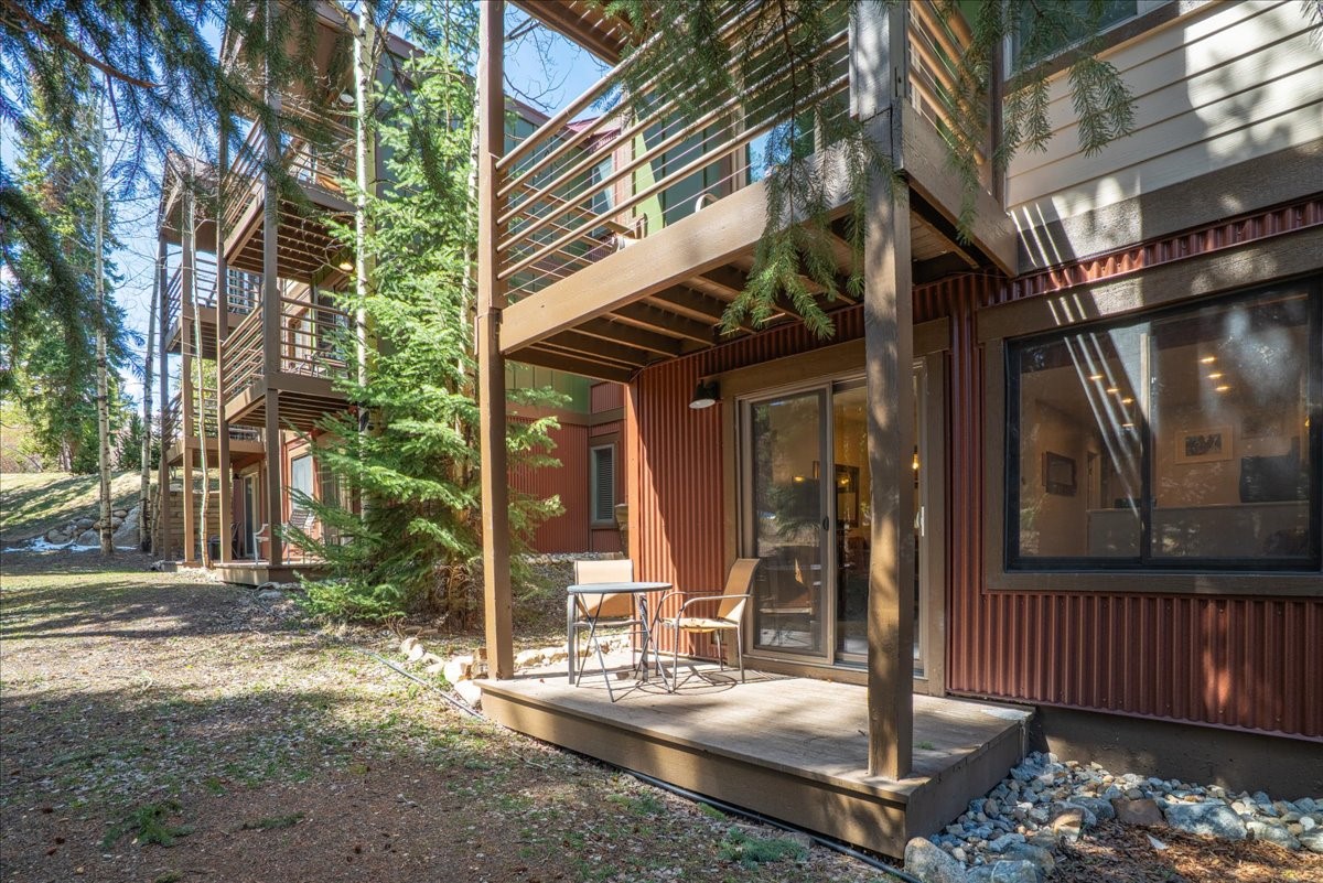 120 Sawmill Road, Unit 106 Breckenridge, CO 80424 - Photo 19 of 25 a view of a building with a tree