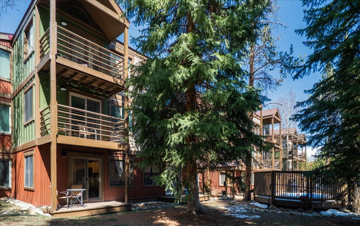 120 Sawmill Road, Unit 106 Breckenridge, CO 80424 - Photo 20 of 25 a front view of a building with street view