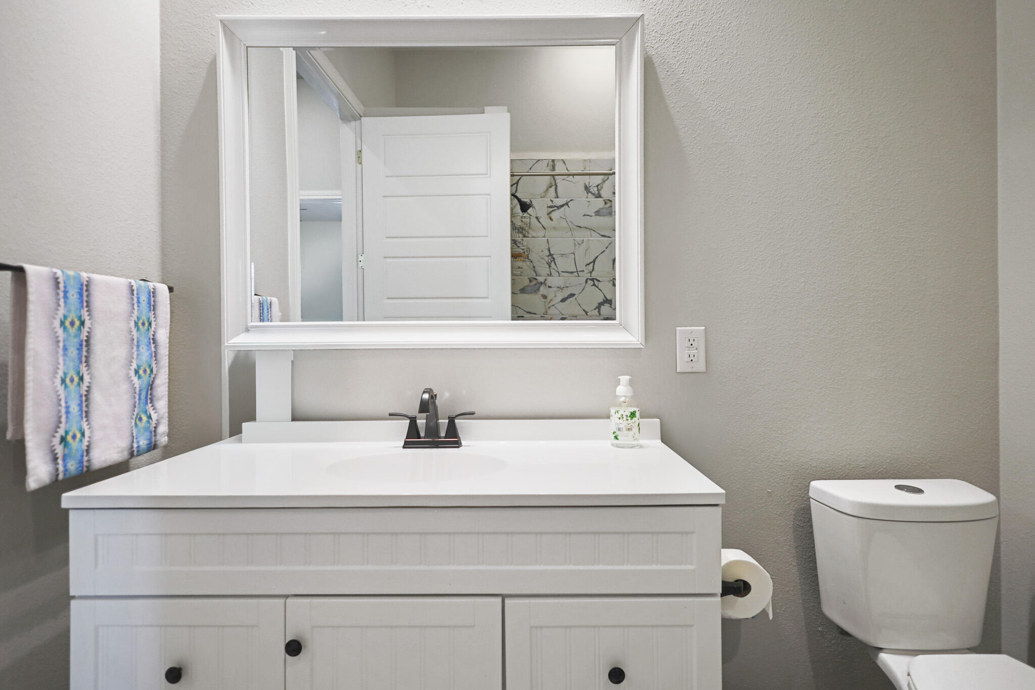 301 Fagan Road Snyder, TX 79549 - Photo 70 of 102 a bathroom with a sink and a toilet