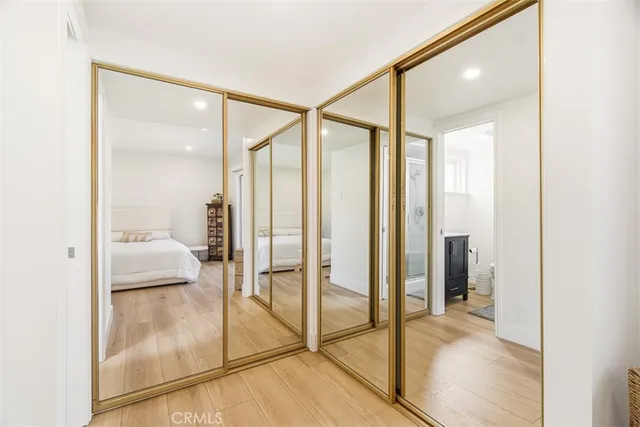 a bathroom with a glass shower door