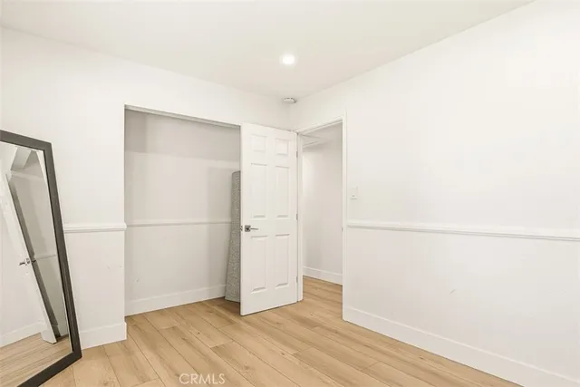 a view of small space with wooden floor