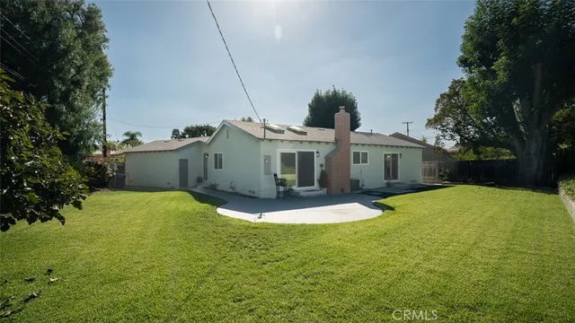 a view of swimming pool with patio