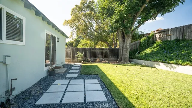a view of a yard with an outdoor space