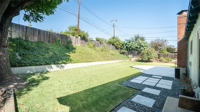 a view of swimming pool with patio