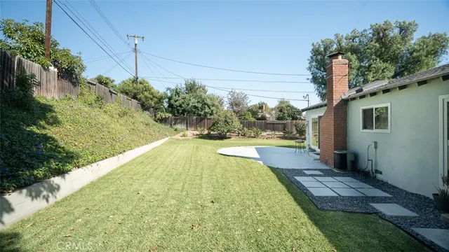 an aerial view of a house with a garden