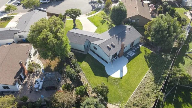 an aerial view of a house with a garden